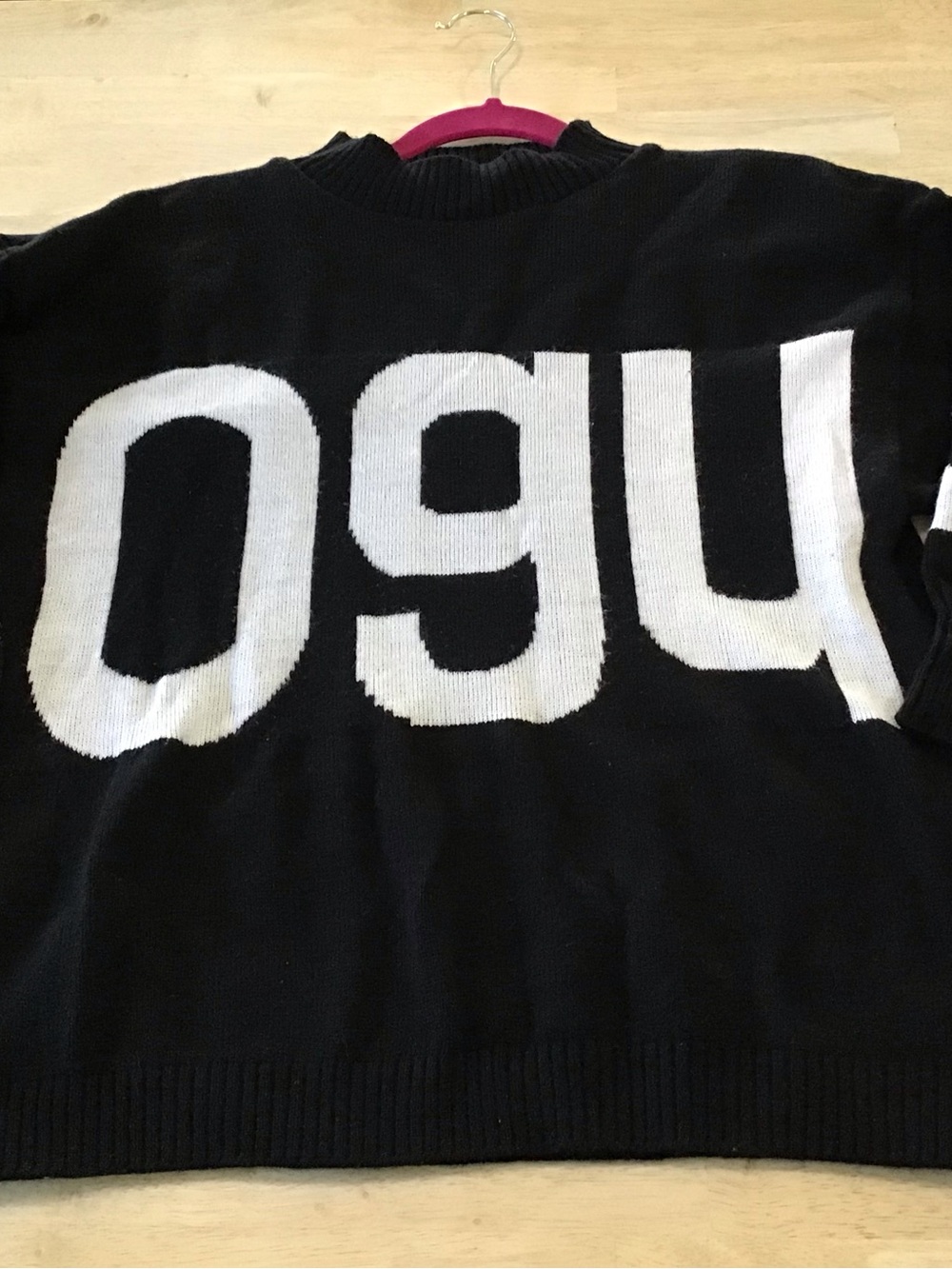 Black and White Crewneck Sweater with Bold Graphic